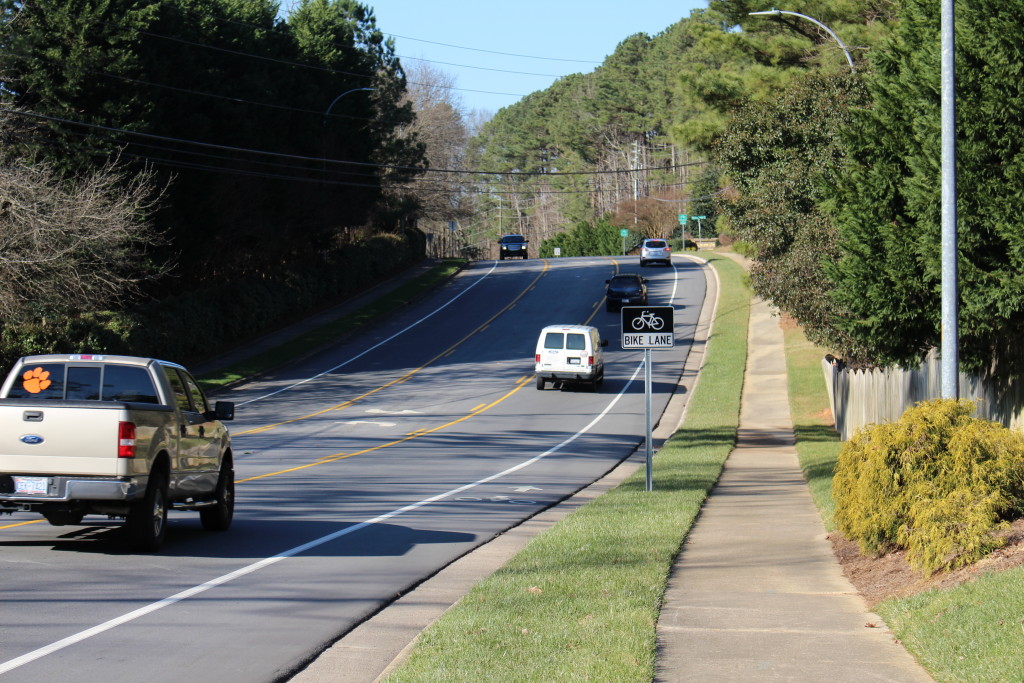 Well-designed bike lane. This wide bike lane leaves plenty of room for maneuvering. The motor vehicle lane is also wide and can accommodate bus and truck traffic while still leaving plenty of clearance between motorist and bicyclist traffic. Lake Pine Drive, Cary, NC. Photo: Steven Goodridge.